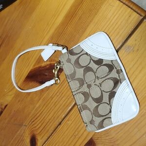 Coach brown and cream wristlet